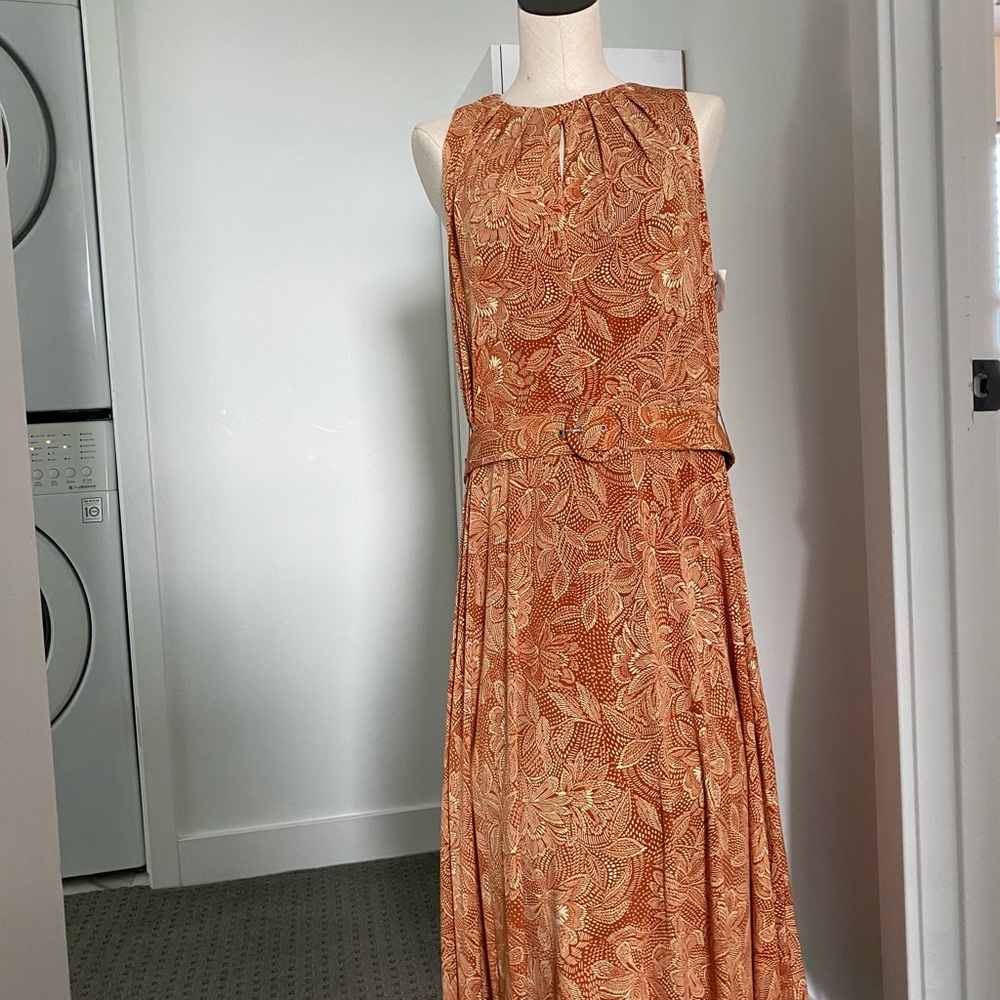 Size 14 sleeveless dress with belt. NWT